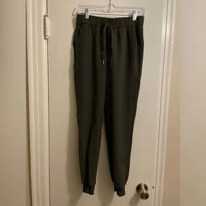 LULULEMON On The Fly Crop Joggers Dark Olive Size 4
